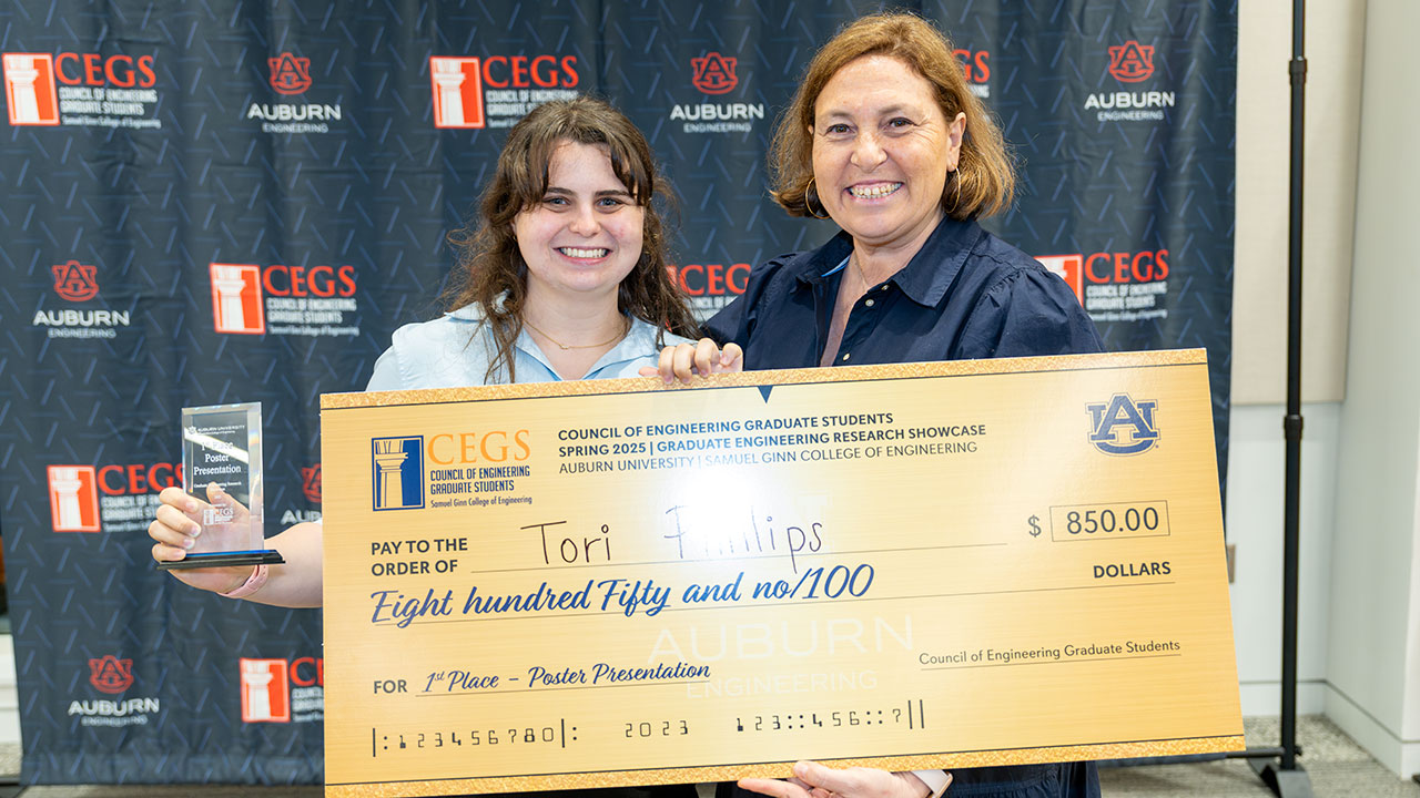 Graduate Engineering Research Showcase winner Tori Phillips, left, with Maria Auad, the college's associate dean for graduate studies and faculty development.